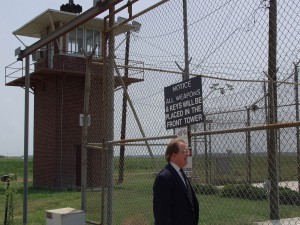prison Chaplain Wigelsworth outside the fences of a prison