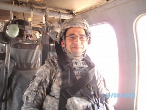 Chaplain Serrano on a helicopter in Iraq.