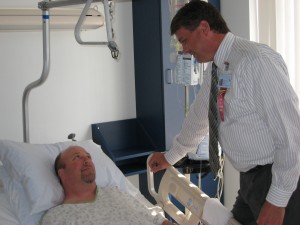 Chaplain Harwood makes a hospital visit.