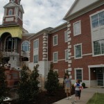 Students leave the completed Phase One of the science and math complex at Lee University, while construction continues on Phase Two.
