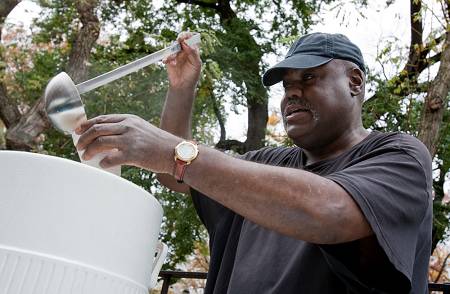 imageserverdb1 Vaughn McLamb, with Graffiti Church on Manhattan's Lower East Side, ladles steaming cups of chicken soup for the crowd gathered at Tompkins Square Park. McLamb found Graffiti when he was a drug addict living on the streets. Photo by Peter Field Peck.