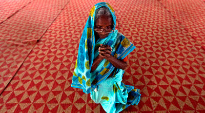 reuters-india-christian-woman-prays-photog-rupak-de-chowdhuri