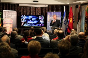 Director of Church of God World Missions, Tim Hill, addresses the gathering at the announcement of the 'Year of the Missionary' program (click on photo to enlarge).