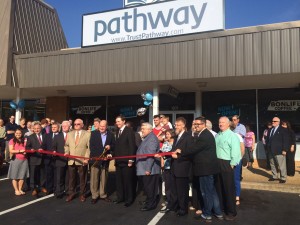 General Overseer Mark Williams, center right, and Cleveland Mayor Tom Rowland hold the scissors to officially open the new Pathway on September 1, 2015 (click photo to enlarge).
