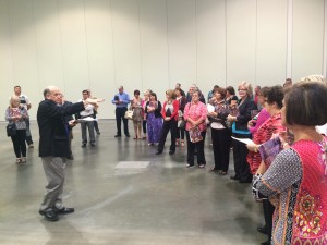 David Ray, center left, points out dimensions of the exhibit hall at the Music City Center (click photo to enlarge)