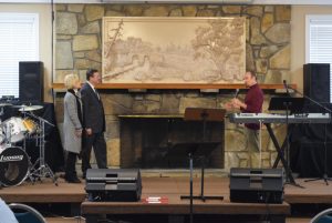 Donald McCorkle, right, presents the mural to SMCH Director Walt Mauldin and Tammie Mauldin (click on photo to enlarge).